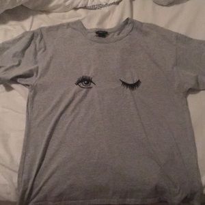 Gray t-shirt with winky face